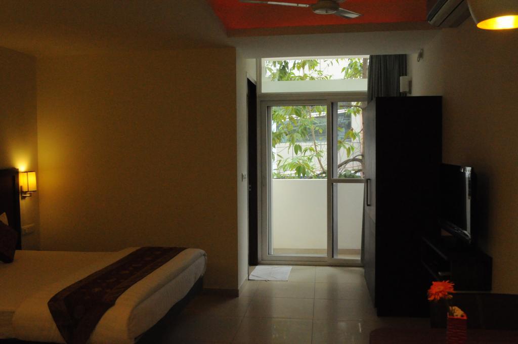 Ixora Suites Bangalore Quarto foto
