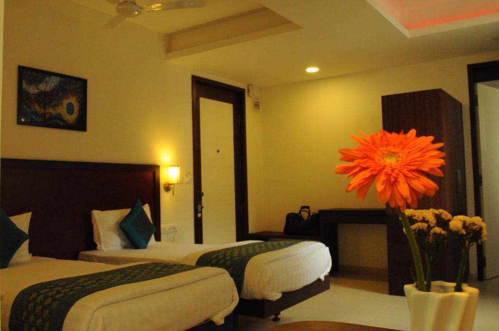 Ixora Suites Bangalore Quarto foto
