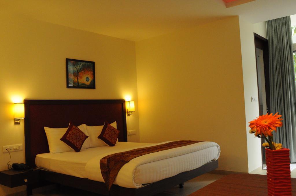 Ixora Suites Bangalore Quarto foto