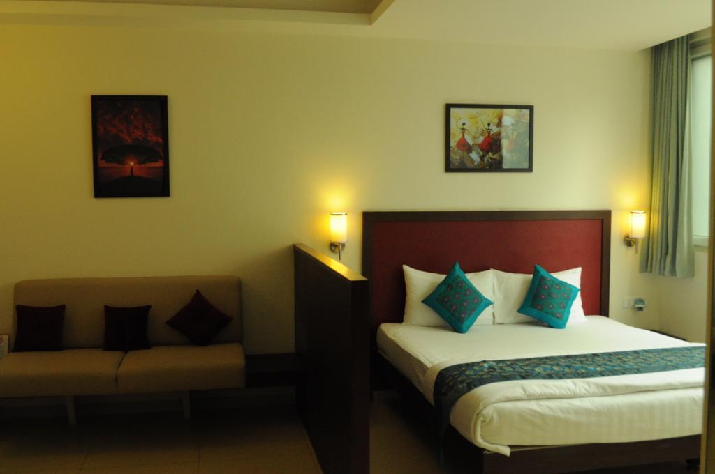 Ixora Suites Bangalore Quarto foto