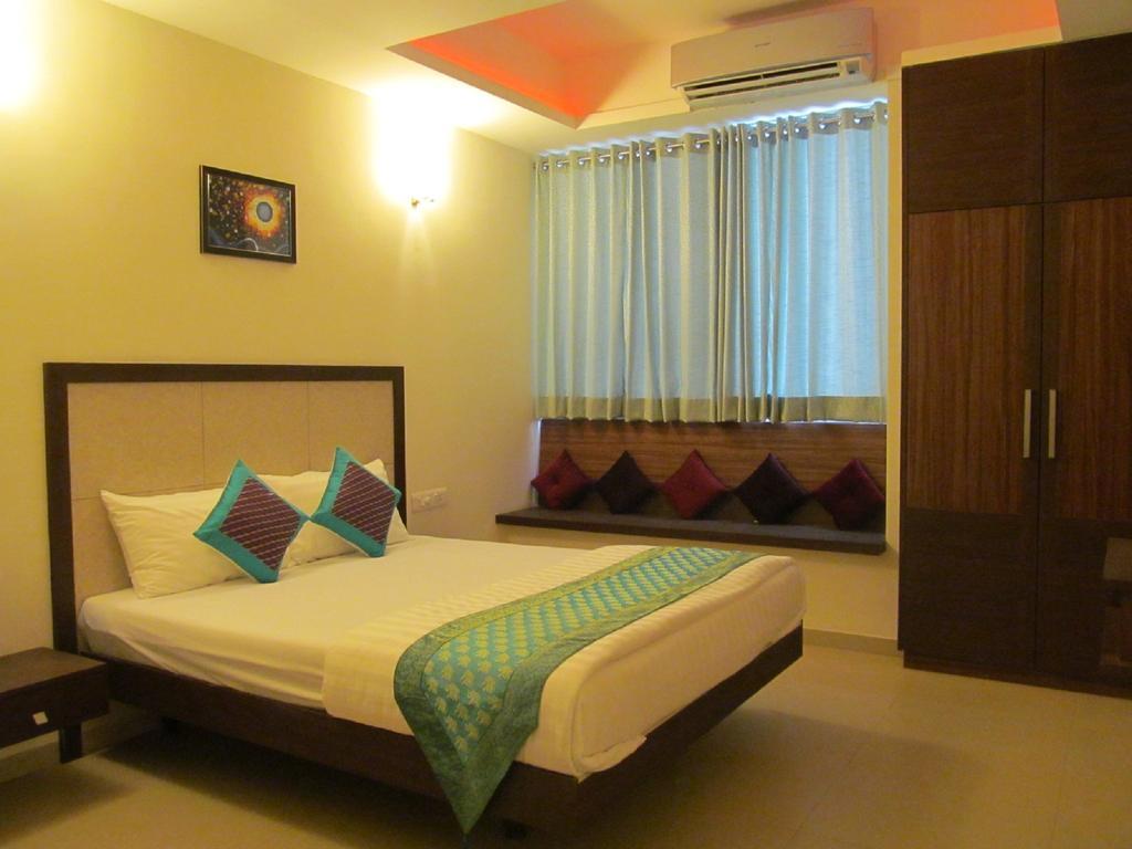 Ixora Suites Bangalore Quarto foto