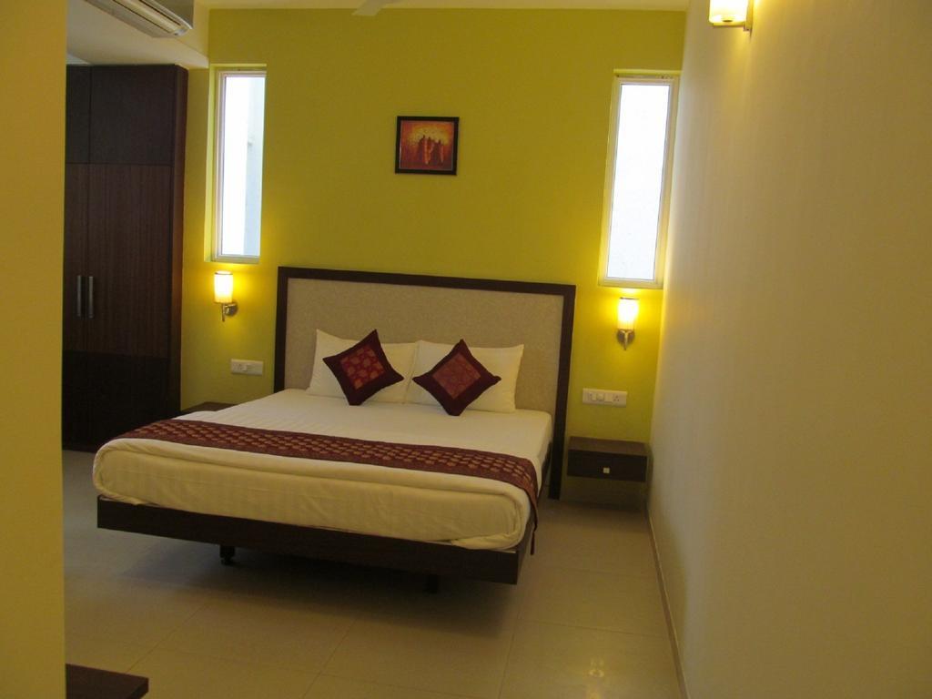 Ixora Suites Bangalore Quarto foto