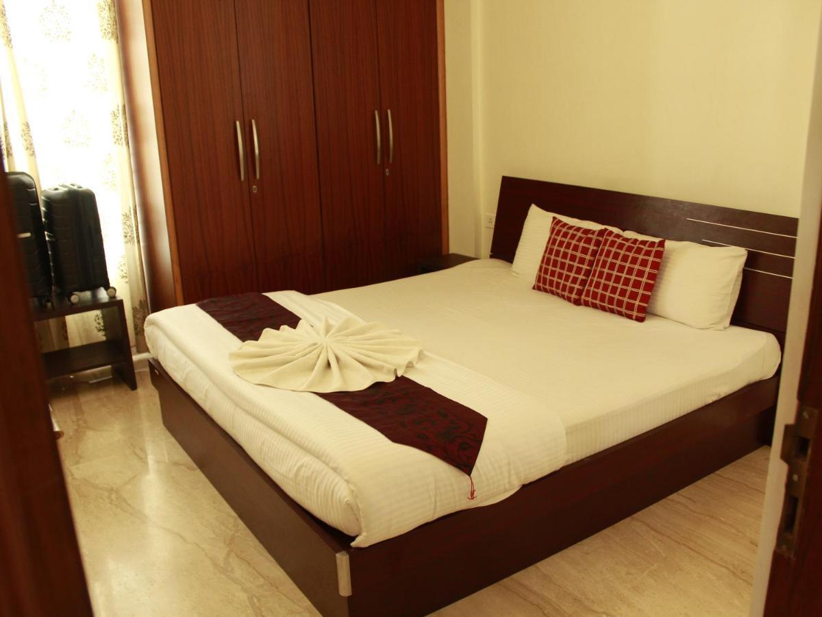 Ixora Suites Bangalore Exterior foto